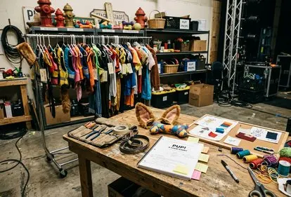 A theatre spotlight glows over a musical stage